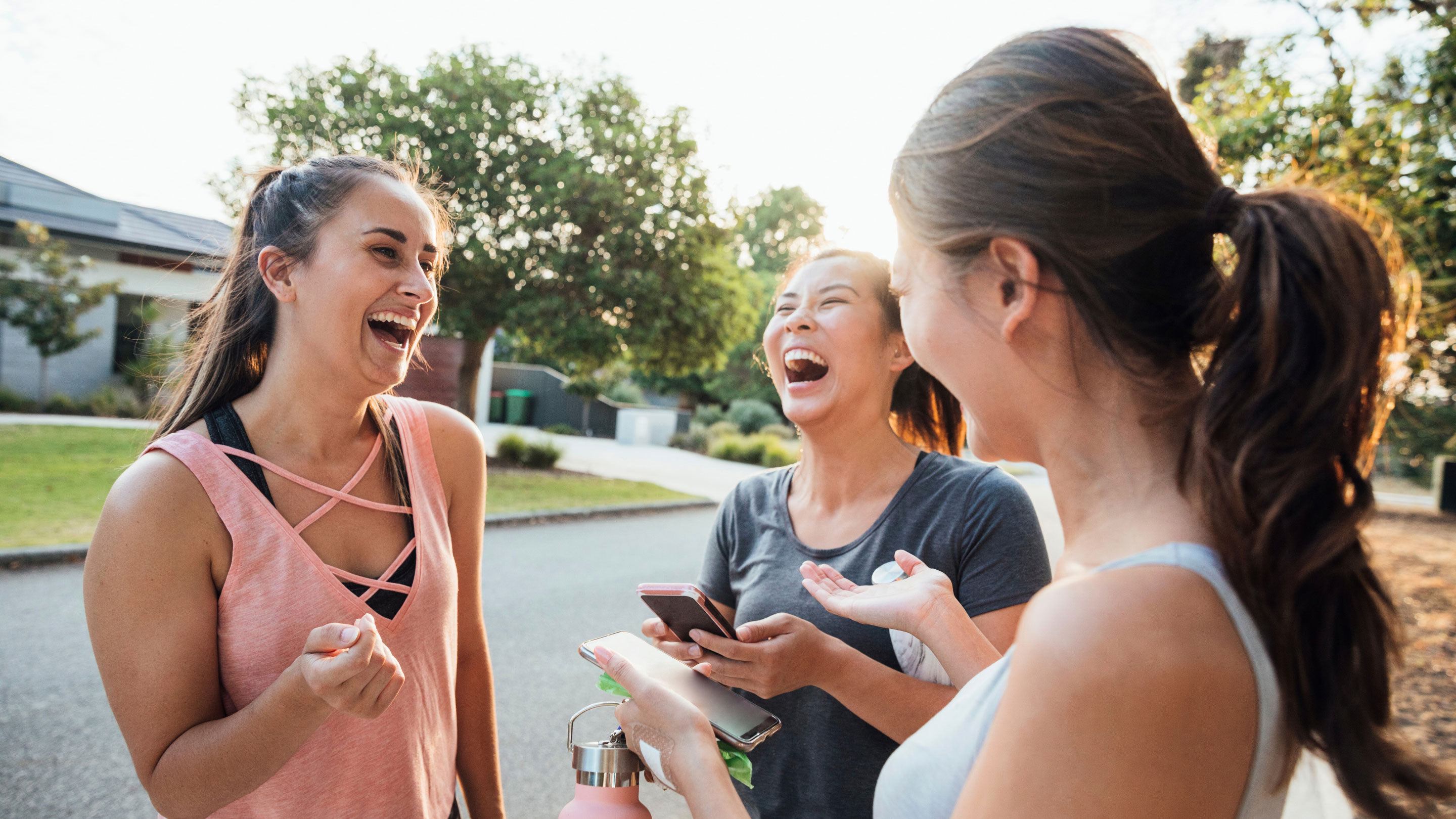 Women exercising and laughing
